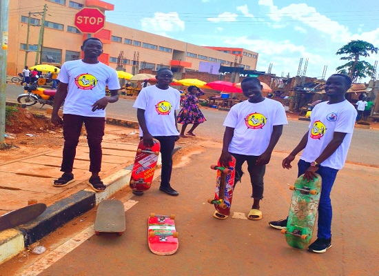 KiSS Skateboard members skating at Stanbic Street